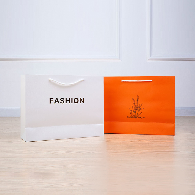 Bolsas de compras de papel de regalo con estampado de oro con logotipo personalizado de lujo